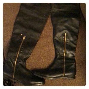 Black leather knee high boots with side zipper